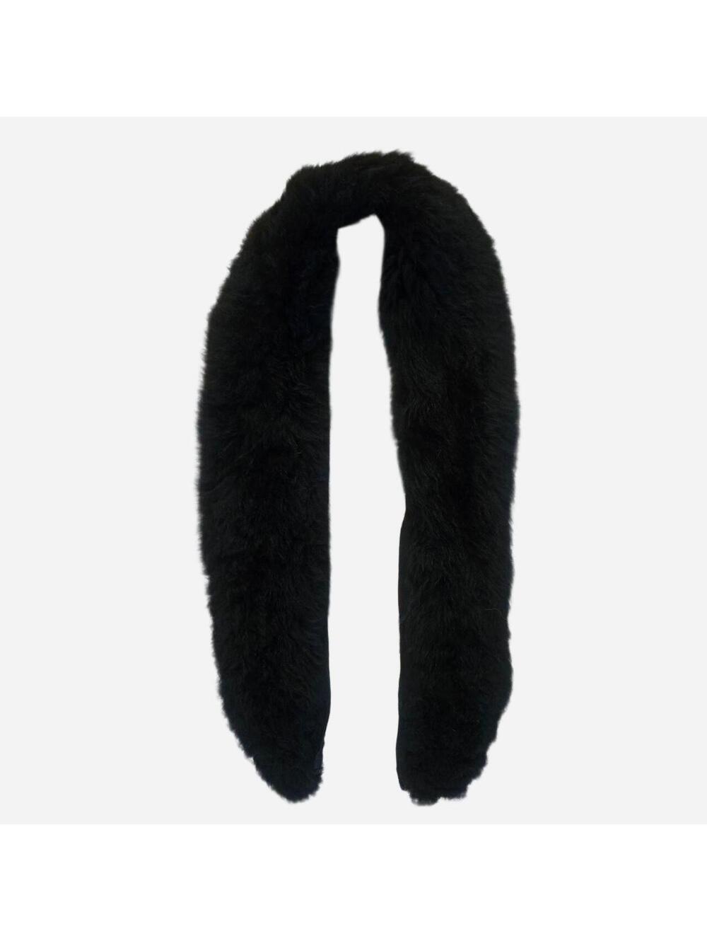 Vintage 1990s with this stunning,  black faux fur accessory.